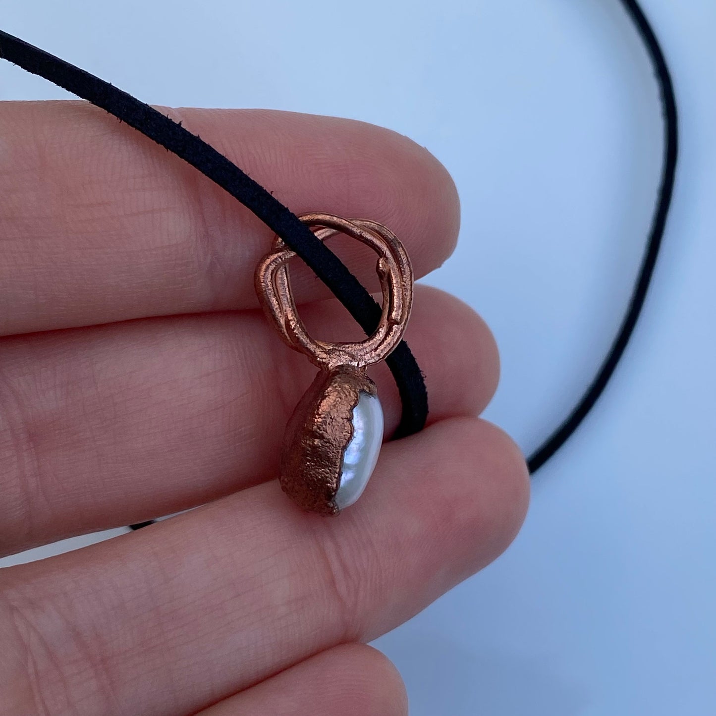 Handcrafted Copper Pendant with Pearl Accent