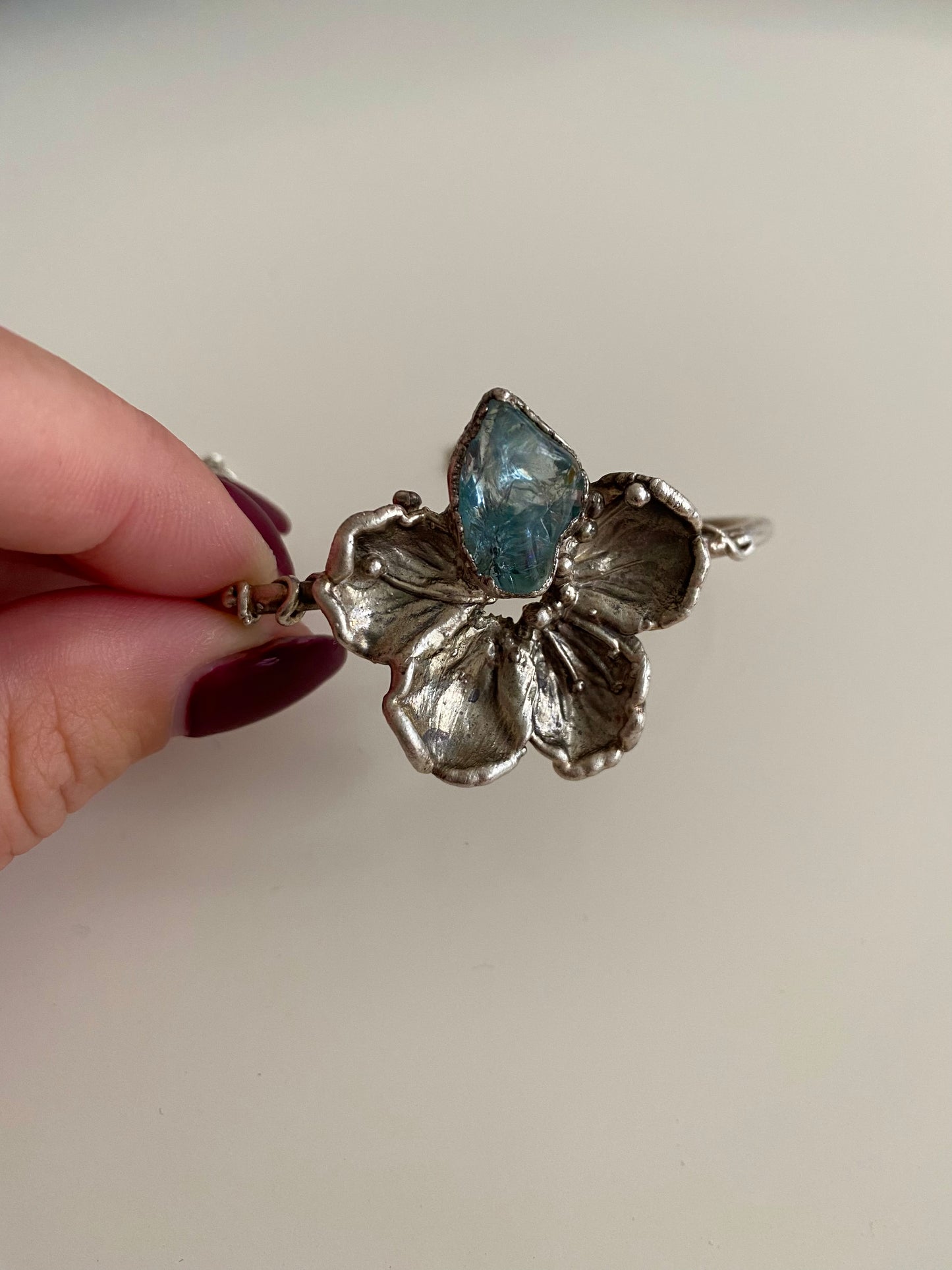 Blue topaz bracelet with real apple flower